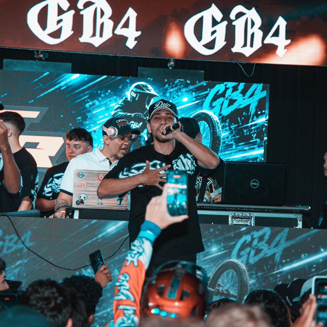 Davell on stage with a microphone